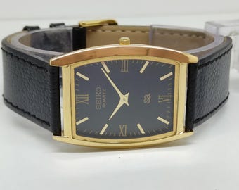 Reloj Seiko de cuarzo fino chapado en oro vintage: esfera negra restaurada, reloj de pulsera para hombre