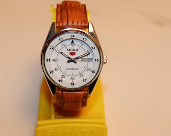 Reloj de pulsera automático Seiko 5 vintage renovado con esfera blanca, 36 mm, fabricado en Japón.