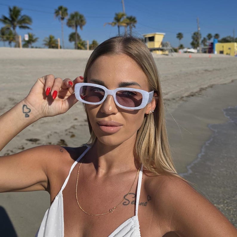 Personalized bridal sunglasses in white with bride lettering, stylish wedding sunglasses for beach bride, boho bridal accessory, bachelorette party fashion eyewear, tropical honeymoon sunglasses for bride-to-be.