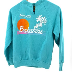 Vintage jaren 90 Jerzees by Russell Teal Graphic Nassau Sunset Raglan Sweatshirt