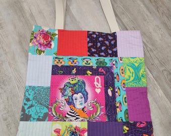 Curiouser and curiouser tote bag