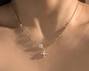 Sierlijke sneeuwvlokhangerketting: titaniumstaal wintersieraden