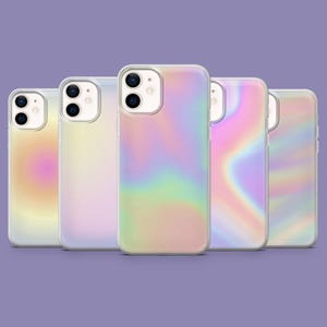 May include: Five clear phone cases with a pearlescent, iridescent design. The cases have a soft, colorful gradient effect, with hues of yellow, pink, green, and purple. The phone cases are arranged in a row, showcasing their unique, shimmering appearance.