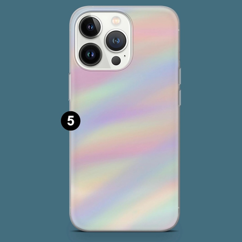 May include: A smartphone case with a pearlescent, iridescent design. The case has a clear border and features a swirling pattern of pastel colors, including pink, yellow, and blue. The number "5" is printed in black on the case.