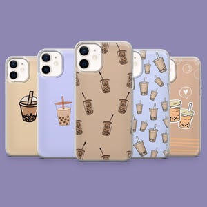 May include: A collection of phone cases with various designs featuring bubble tea. The cases are in different colors, including tan, lavender, and brown. Each case has a unique pattern of bubble tea cups with straws.