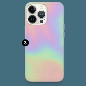 May include: A smartphone case with a vibrant, iridescent design. The case features a smooth, glossy finish with a blend of pastel colors, including pink, yellow, and blue. The number "3" is printed in black on the case. The case is designed to fit a smartphone with multiple camera lenses.