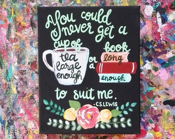May include: A black canvas painting with white lettering that reads "You could never get a cup of tea large enough or a book long enough to suit me."  The quote is attributed to C.S. Lewis. The painting also features a white teacup and a stack of red books.