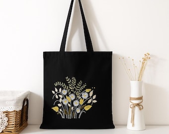 Borsa tote nera ricamata con motivi floreali