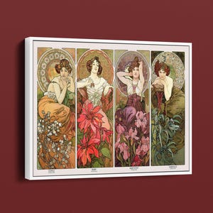 Könnte beinhalten: Ein gerahmter Kunstdruck mit vier Frauen im Jugendstil, jede umgeben von floralen Elementen. Die Farbpalette umfasst Gold, Orange, Rot, Lila und Grün. Das Kunstwerk ist mit "Topas", "Rubin", "Amethyst" und "Smaragd" beschriftet.