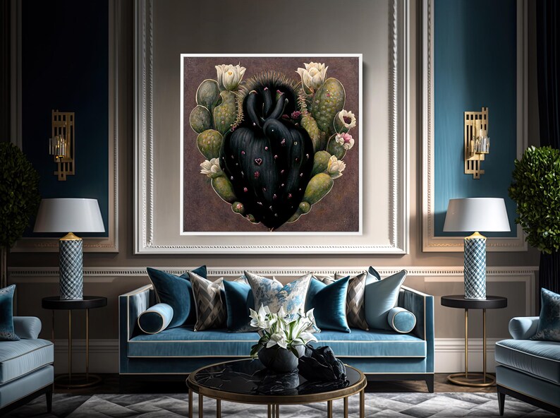 May include: A framed artwork featuring a stylized black cactus heart surrounded by green cacti and white flowers. The artwork is displayed in a luxurious living room with a blue sofa, decorative pillows, and matching lamps.