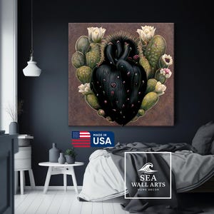May include: A canvas wall art piece featuring a heart-shaped cactus design. The artwork showcases a dark, textured heart shape surrounded by green cacti and white flowers. The words "MADE IN USA" are visible.