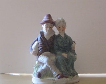 Vintage figurine bisque man and woman on bench Limited Edition JJ 5000 series