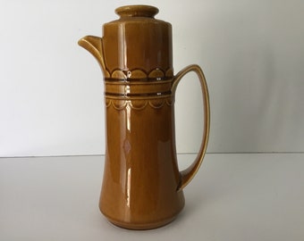 Vintage caramel colored pottery teapot or carafe brown scallops