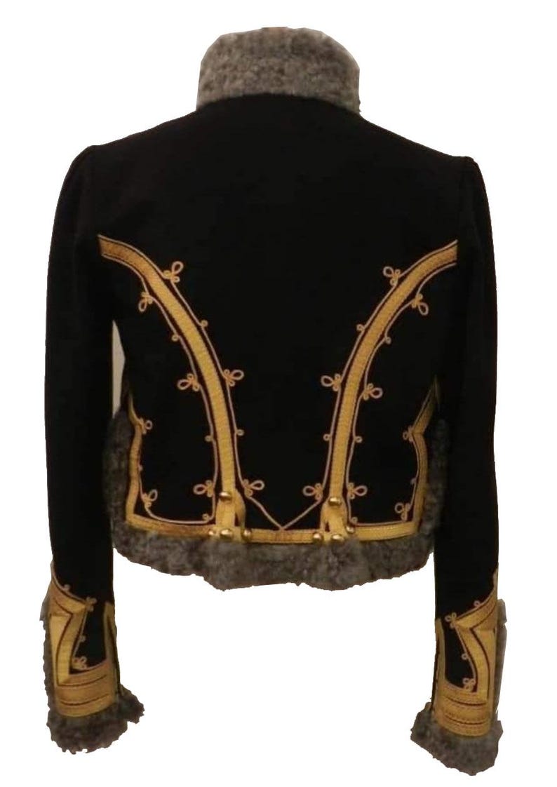 May include: Black jacket with gold embroidery and gray fur trim. The jacket features ornate gold detailing along the edges and back, with decorative tassels. The collar and cuffs are trimmed with gray fur, creating a luxurious look.
