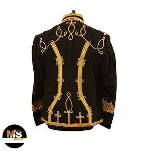May include: Black jacket with gold embroidery. The back of the jacket features elaborate gold thread designs, including symmetrical patterns and decorative borders. The jacket has long sleeves and a high collar, with gold trim.