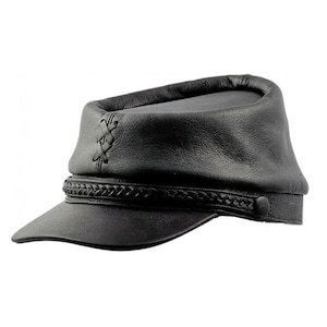 May include: Black leather cap with a short brim and a braided band. The cap features decorative stitching on the side and a button detail. A stylish accessory.
