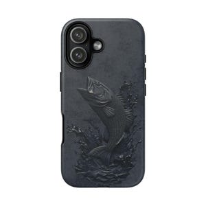 May include: Black phone case featuring a 3D sculpted largemouth bass leaping out of water. The case has a textured finish and a camera cutout. The design is a dark, monochromatic color scheme.