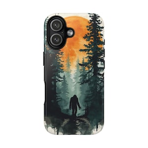 May include: A phone case featuring a Bigfoot silhouette walking through a forest. The design includes tall green trees, a large orange moon, and a dark path. The case has a glossy finish and a camera cutout.