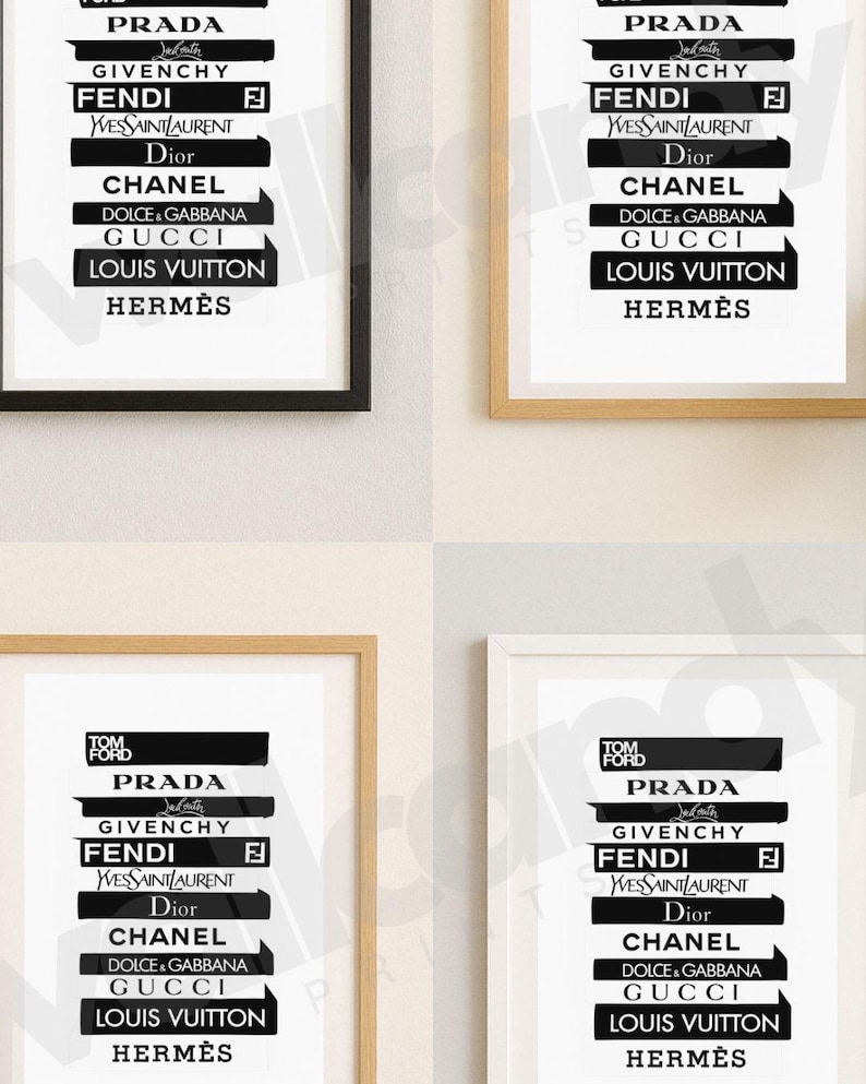May include: Four framed prints with a minimalist design featuring luxury brand logos in black and white. The brands include Prada, Chanel, Gucci, and others. Each print is in a different coloured frame: black, gold, and white.