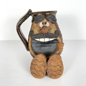 Mug vintage en poterie grimace
