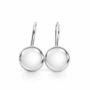 May include: A pair of silver-toned drop earrings featuring smooth, circular, polished metal discs suspended from curved ear wires. The earrings have a reflective, metallic finish and a simple, rounded design that hangs vertically.