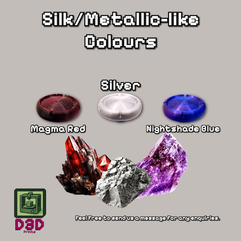 May include: Image showcasing 3D-printed items in silk/metallic-like colors. Includes Magma Red, Silver, and Nightshade Blue circular objects, along with red, silver, and purple crystal formations. The text reads "Silk/Metallic-like Colours".