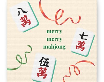 May include: Square card with the words "merry merry mahjong" in green text. The card features three mahjong tiles with red and black characters, and red and green ribbons. The background is a light beige color.