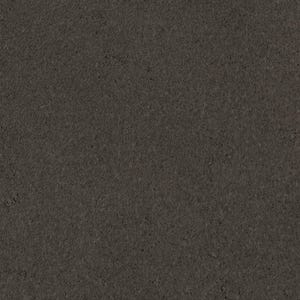 The image is a dark grey or black background with no discernible objects or text present.