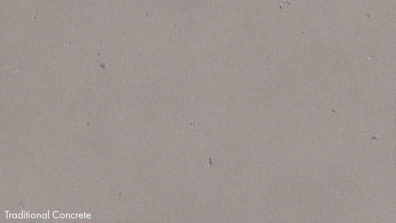 The image is a close-up of a traditional concrete surface, with visible cracks and stains.