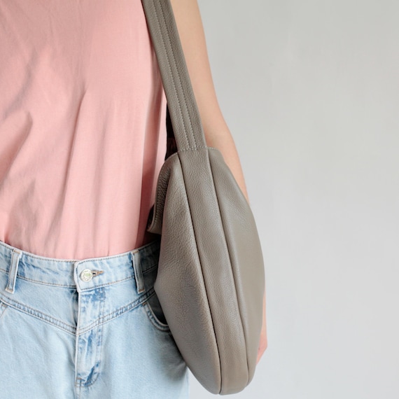 Oval shoulder bag taupe, minimalistic pouch bag
