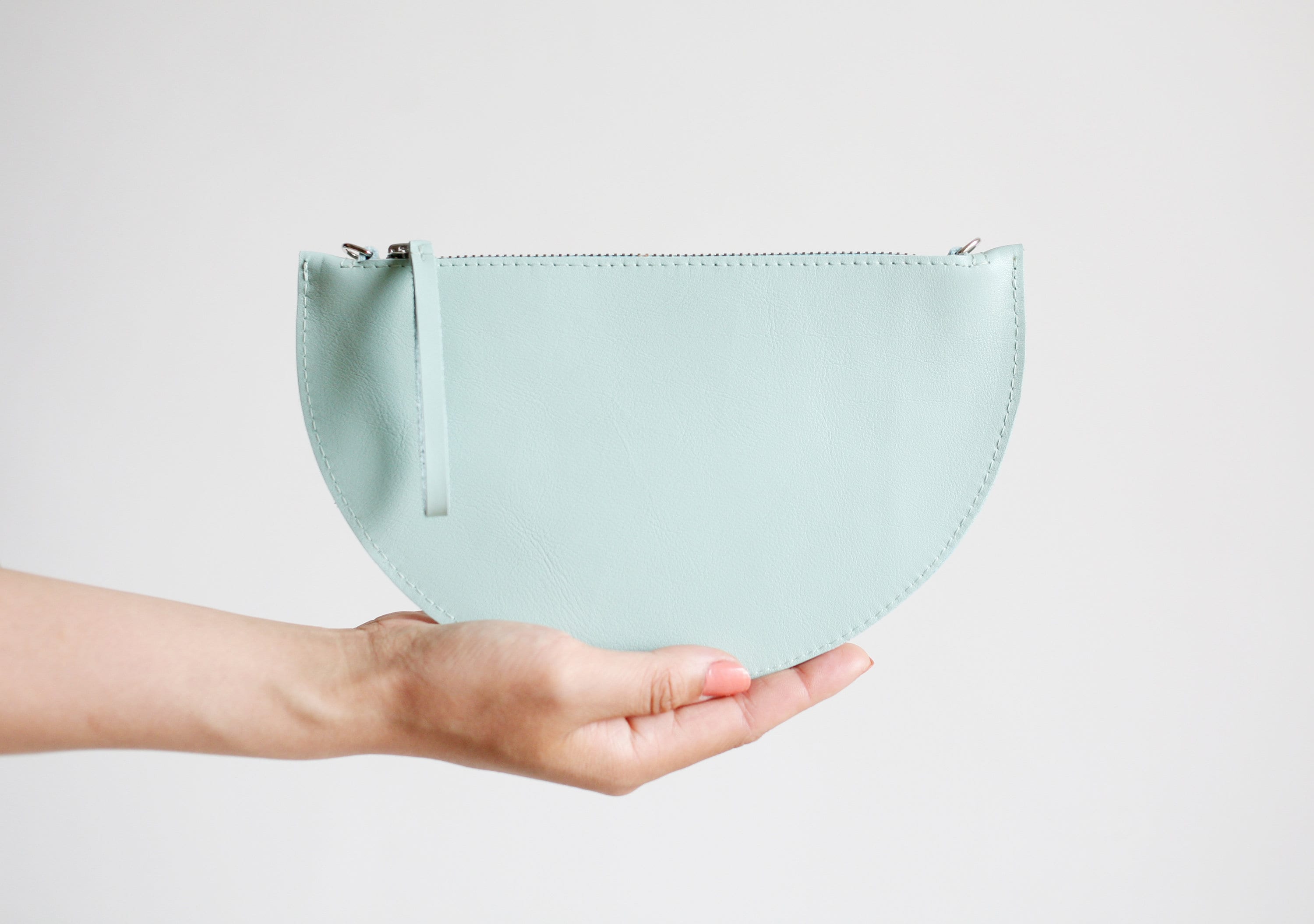half moon clutch