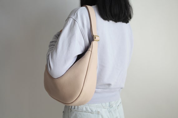 brainy sling bag