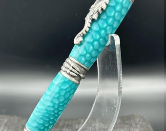 Bolígrafo giratorio de dragón turquesa personalizado