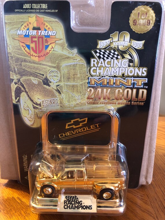 FACTORY ERROR Racing Champions Ford 24K in a Chevrolet