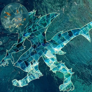 May include: An artistic illustration of a sea creature with a dragon-like form, rendered in shades of blue and turquoise, set against a watery background. A transparent bubble contains several small orange fish. The creature's body has a mosaic-like texture.