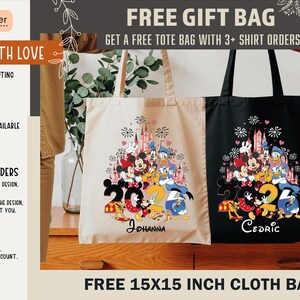 May include: Cream and black tote bags with a Disney character design and the number 2024. The bags have handles and are made of cloth. The cream bag has the name "Johanna" and the black bag has the name "Cedric".