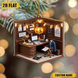 May include: A 2D flat ornament depicting a miniature office scene. The brown office features a desk with a laptop, lamp, and calculator. The text "ANDERSON FINANCIAL" is visible. The ornament has the text "PLAN. PROTECT. PROSPER."