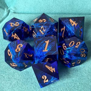 Handcrafted resin sharp edged DND dice set, suitable for D&D, RPG, blue magic textured dice, a unique gift for tabletop game players.