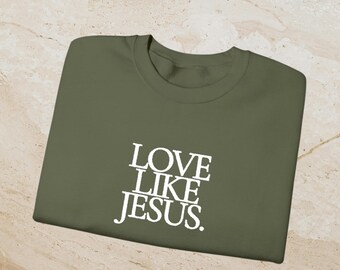 Moletom unissex Heavy Blend™ com bordado "Ame como Jesus" e gola redonda.