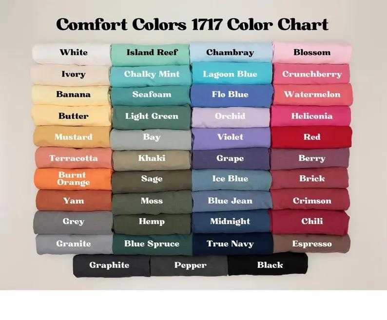 May include: A rectangular wooden chopping board with rounded corners and a juice groove. The natural wood grain is visible. Likely used for food preparation.