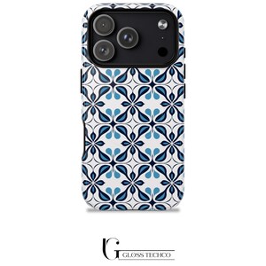 May include: A white phone case with a blue and white floral pattern. The case has a black camera module and the text "GLOSS TECHCO" at the bottom.