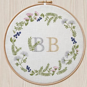 Wildflower Machine Embroidery Design: Frame, Wreath, Border embroidered on hoop