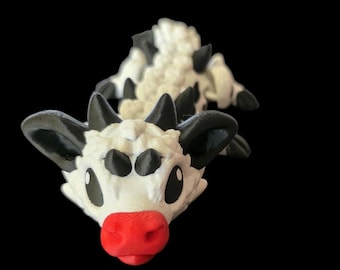 Juguete articulado de vaca bebé dragón