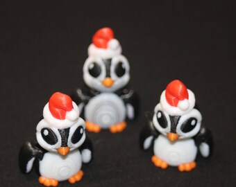 Pingüinos de Santa Claus - Juguete articulado de Cinder, cría de pingüino