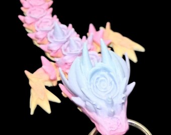 Llaveros de dragón rosa de juguete
