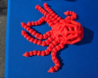 Juguete articulado de pulpo del vacío, un solo color.
