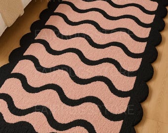 Pink and Black Wavy Tufted Rug: Modern Scalloped Edge Accent Rug