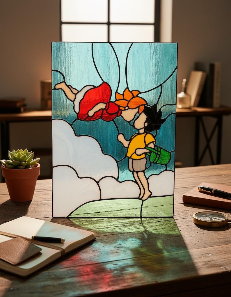 May include: Stained glass panel featuring a whimsical scene of two cartoon figures. One figure is floating in the air, wearing a red dress and holding a flower. The other figure, in a yellow shirt, is holding a green watering can. The background is blue with white clouds.