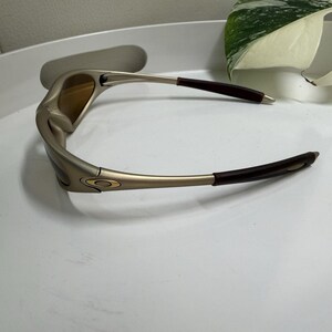 Vintage Oakley Minute 1.0 Sunglasses - Gold Metallic Frame - Amber Lenses - Rare.  USA image 2
