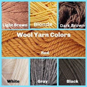 May include: A collection of wool yarn in various colors, including light brown, blonde, dark brown, red, white, gray, and black. The image displays the yarn's texture and color variations, with text labels identifying each shade.
